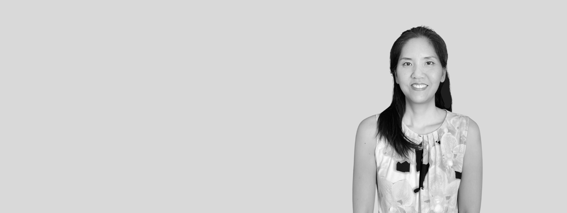 A black and white image of Judy Wang, a therapist who sees people in Maryland, Nevada and South Carolina struggling with anxiety, OCD and trauma. She is EMDR certified and ERP trained
