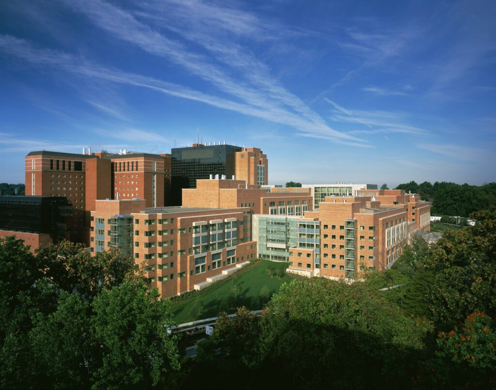brown concrete building under blue sky during daytime for trauma therapy in bethesda, maryland webpage.