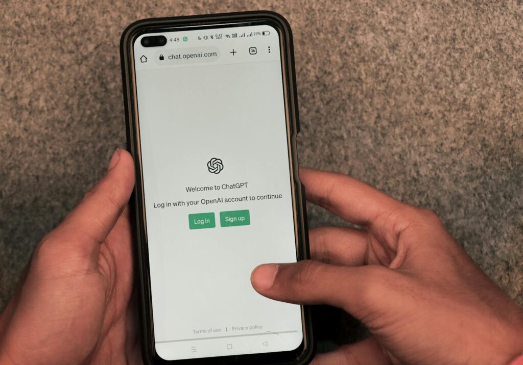 Photo by Sanket Mishra Close-up of smartphone with ChatGPT to illustrate concern over privacy of using chats for AI therapy.
